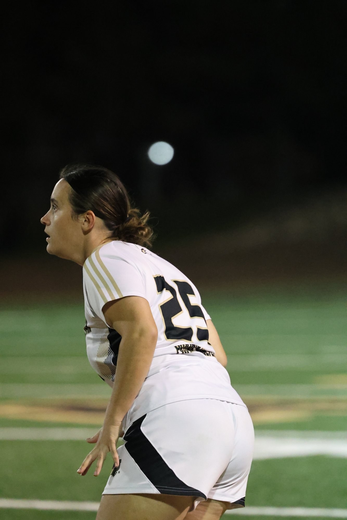 Eryn Marshall #25 in ready stance on the pitch